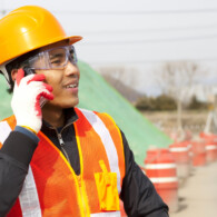 Construction worker talking on the phone