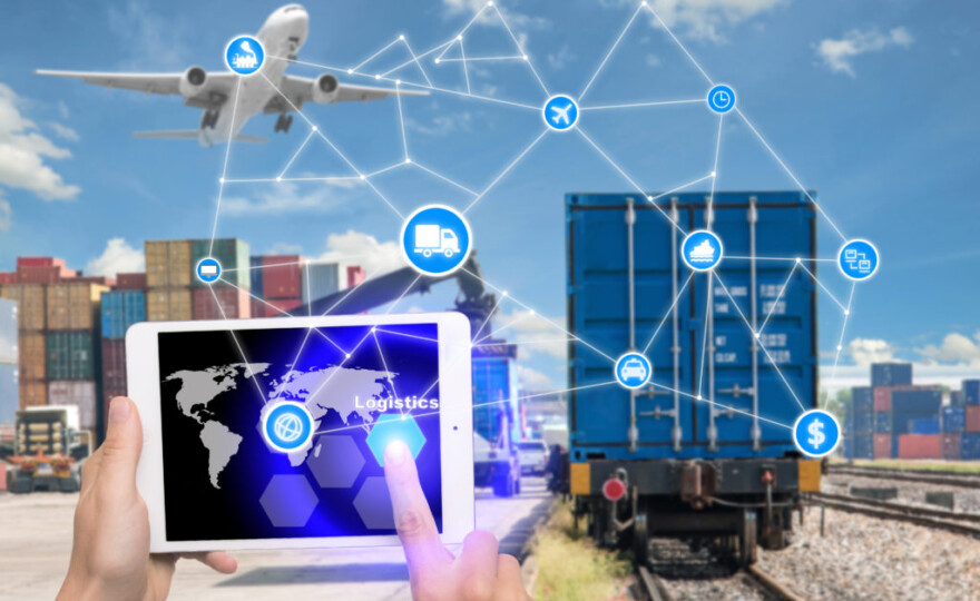 Hand holding tablet is pressing button Logistics connection technology interface global partner connection for logistic import export background. Business logistics concept internet of things